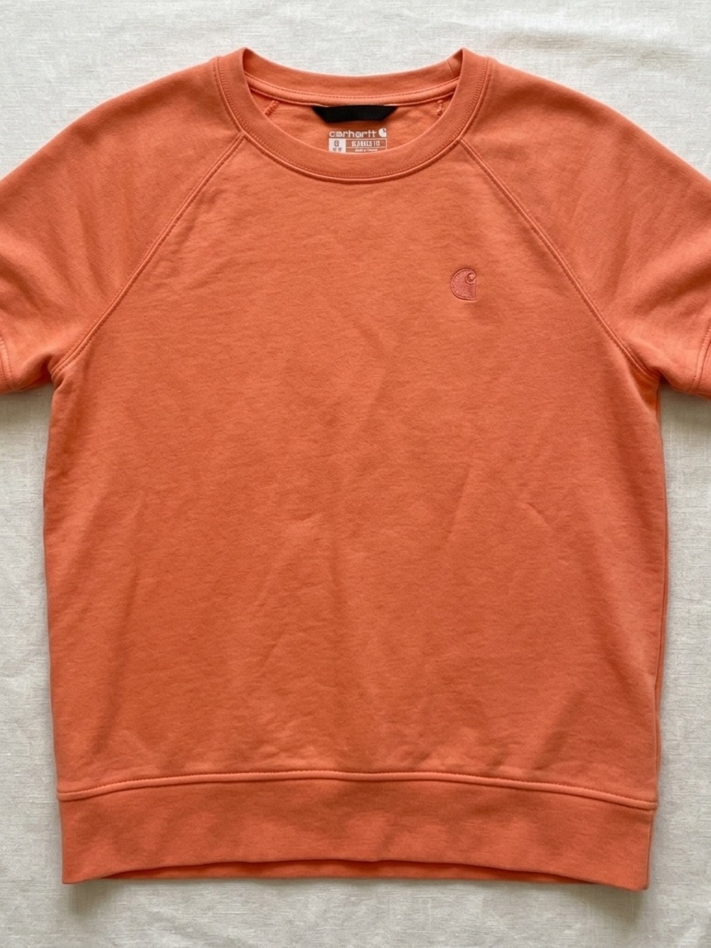 Carhartt Women’s Crewneck Sweatshirt in orange